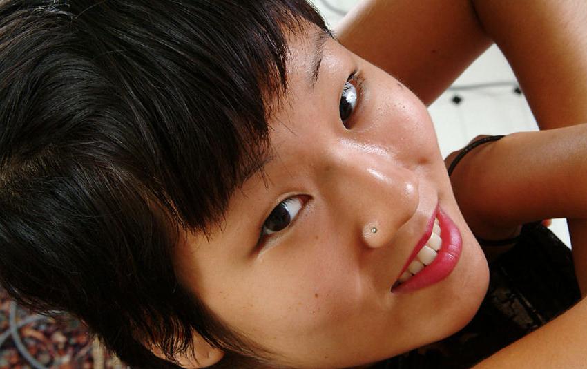 20P Cute Asian gal exposing hairy pussy