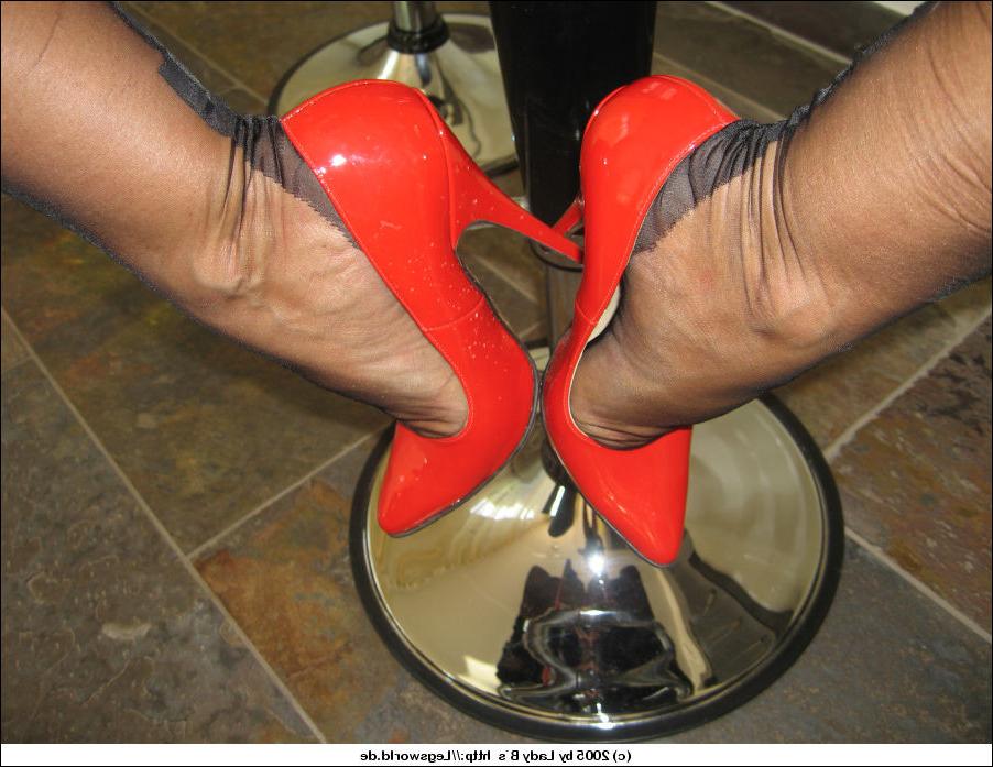 12P Leggy elegant woman in stockings and heels