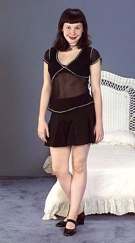 20P Beautiful legs in short black dress