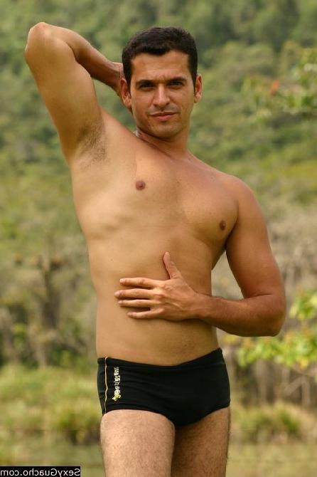 12P Almost naked Latino cutie with a massive hard on and great body