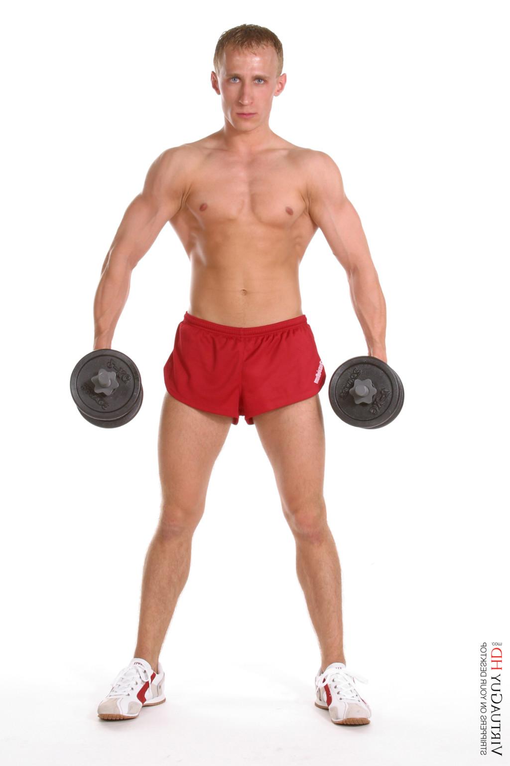15P Muscular blond guy does a workout absolutely naked