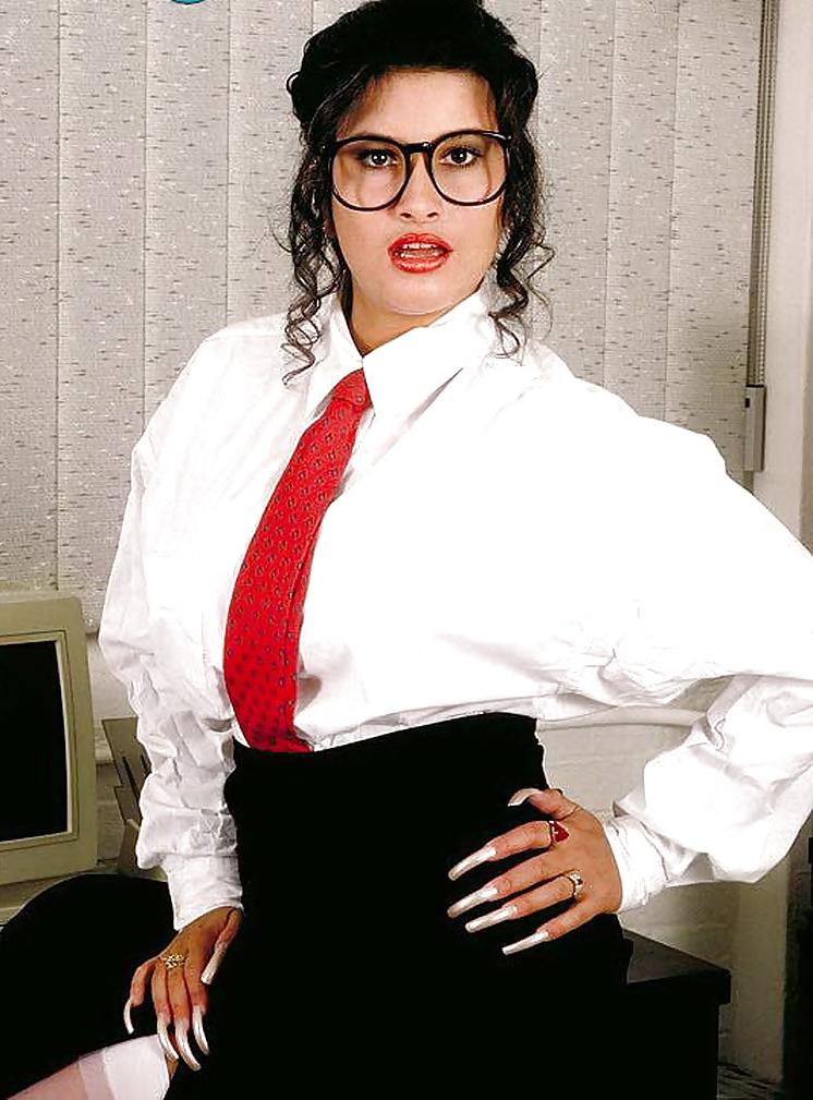20P Busty secretary Zoryna stockings heels