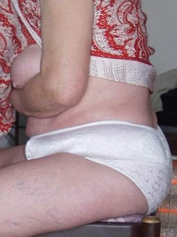 16P Old fart woman shows her big tits and naked ass