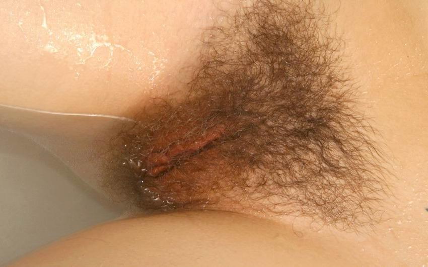15P babe washing her hairy pussy in shower