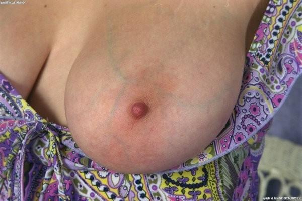 15P hairy Roberta shows us her nice juicy tits