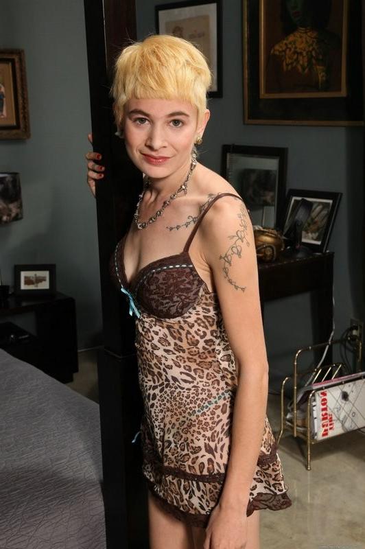 15P Skinny natural Dani displays her hairy pussy