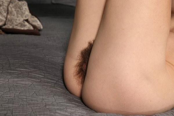 15P Skinny natural Dani displays her hairy pussy