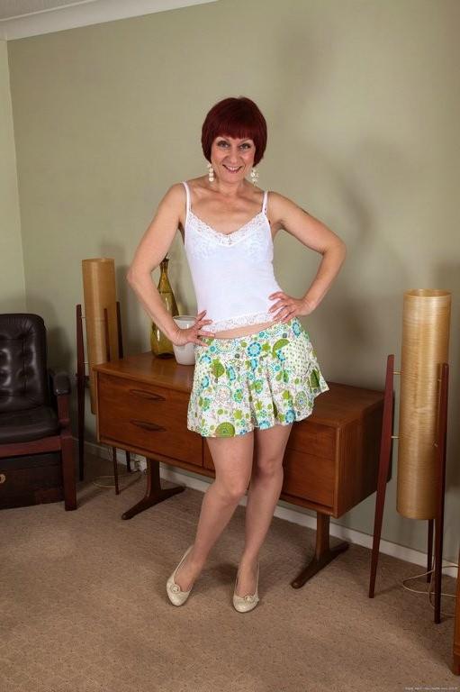 15P Penny Brooks exposes her hairy mature pussy