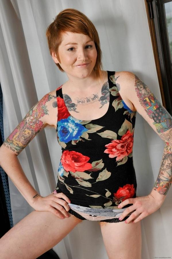 16P Tattooed Hairy Redheaded Hottie Shows Her Fire Bush