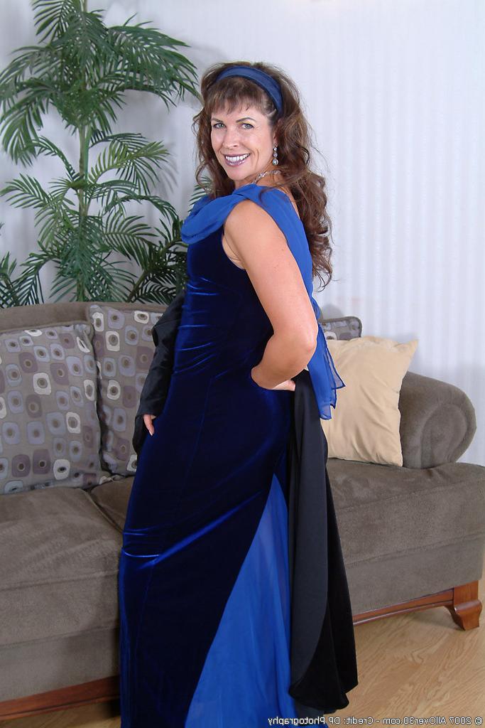 16P elegant older brunette pulls off her lingerie to show hairy puss