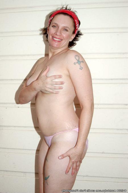 16P Fortyish Natural Woman Bares Full Bush and Tattoo
