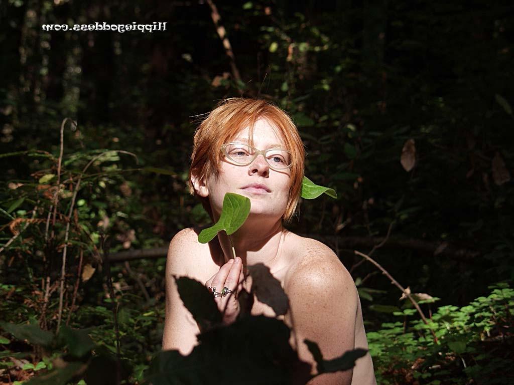 15P Naturally hairy red bush hippie girl nude in the woods