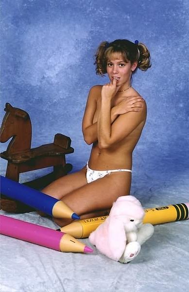 20P Young babe posing naked