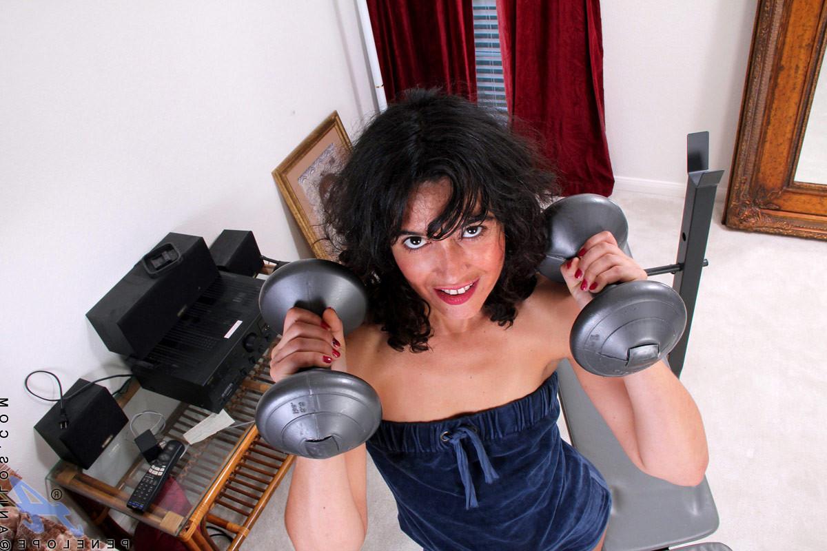 15P After a workout Anilos Penelope slides her fingers deep in her hairy milf pussy