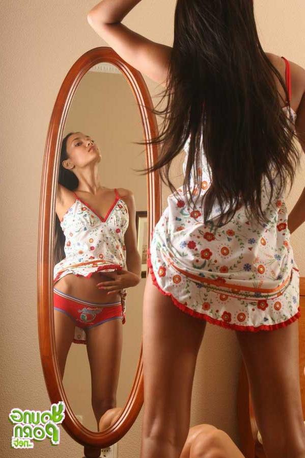 15P Young busty brunette lady posing