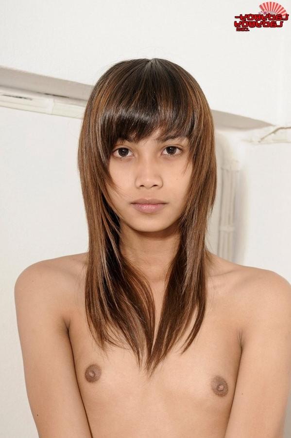 15P Slim Asian Shemale Slowly Strips To Flaunt Her Body