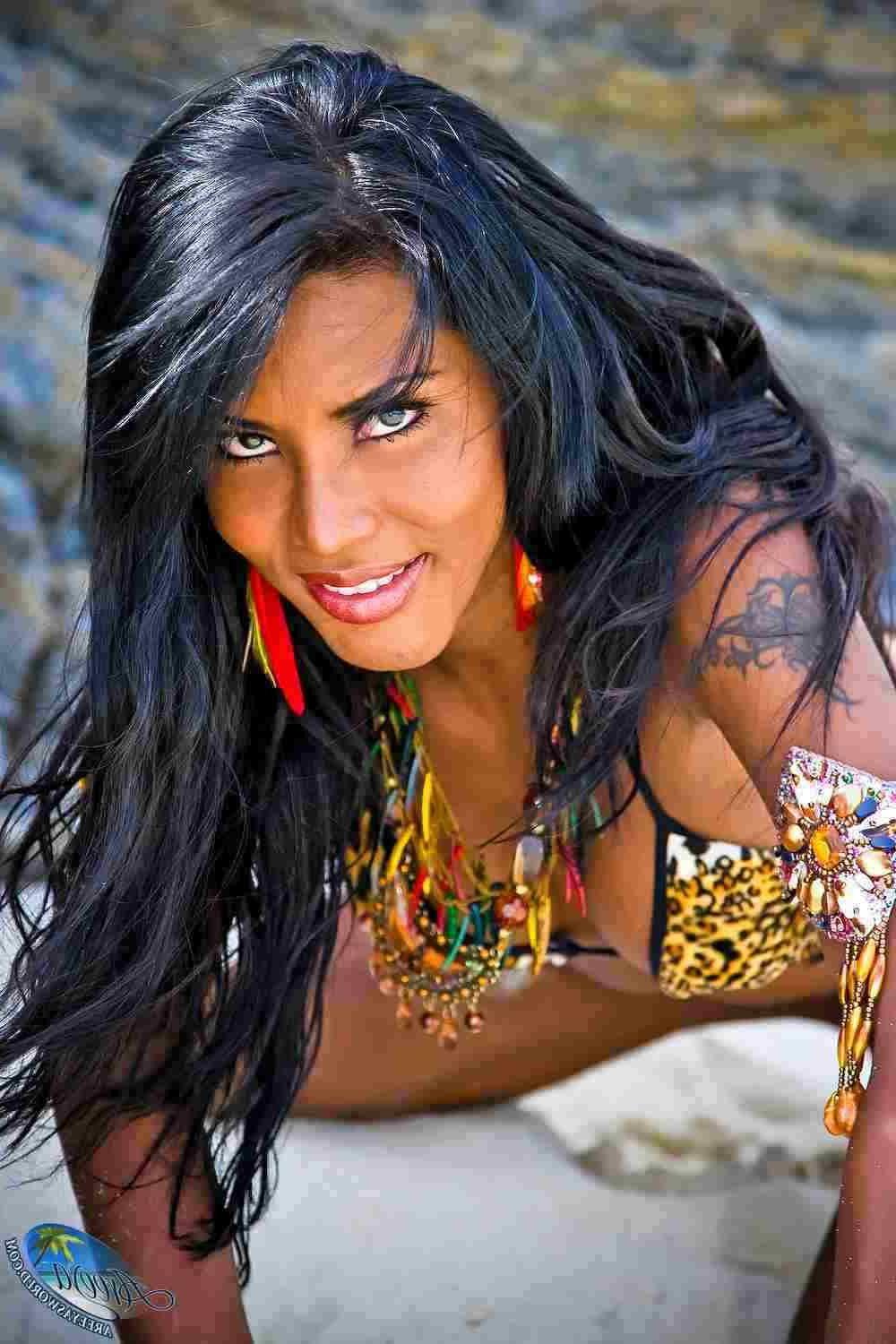 16P Gorgeous shemale in a bikini at the beach