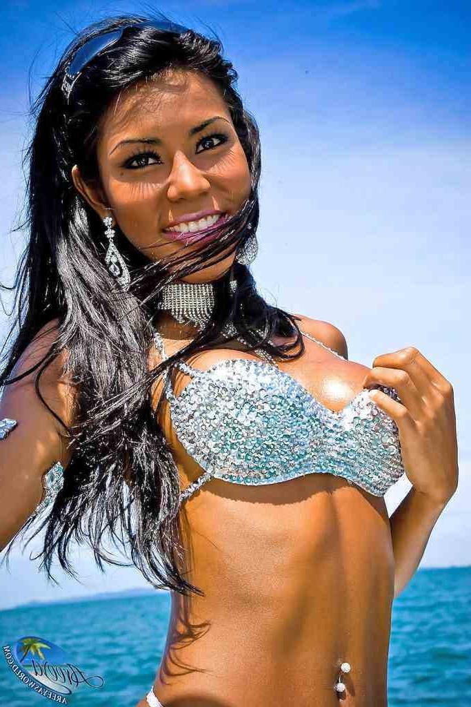 16P Gorgeous shemale in a bikini on a boat
