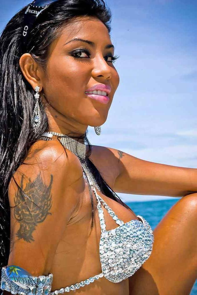16P Gorgeous shemale in a bikini on a boat