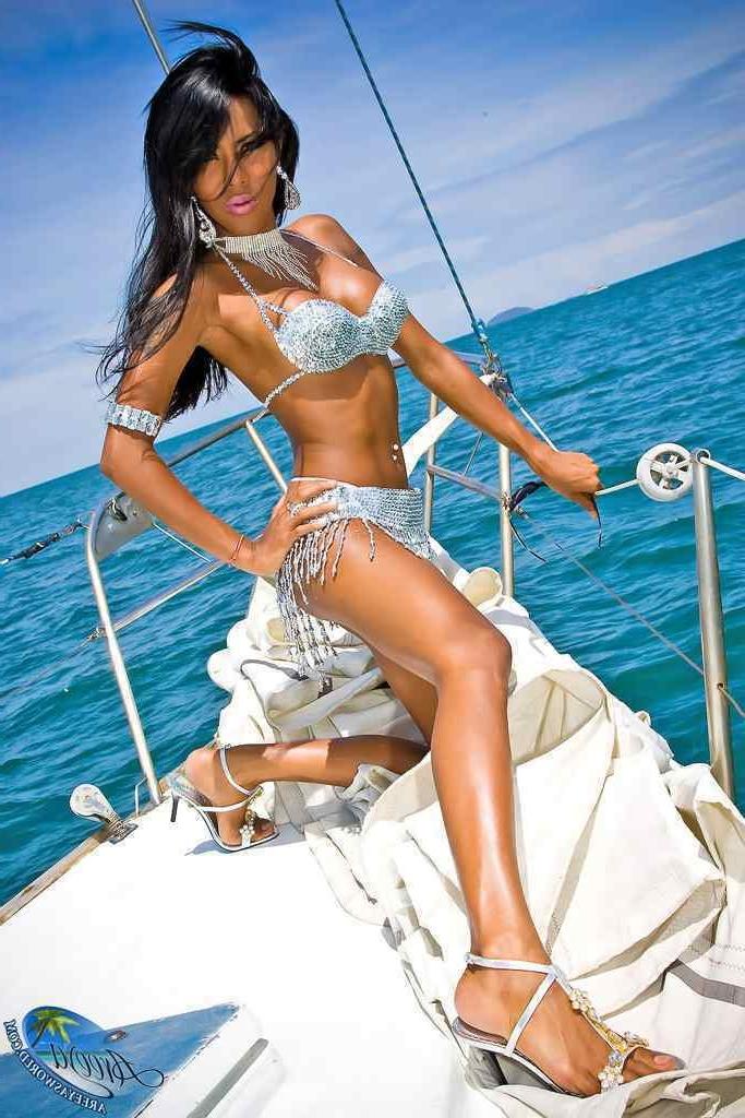 16P Gorgeous shemale in a bikini on a boat