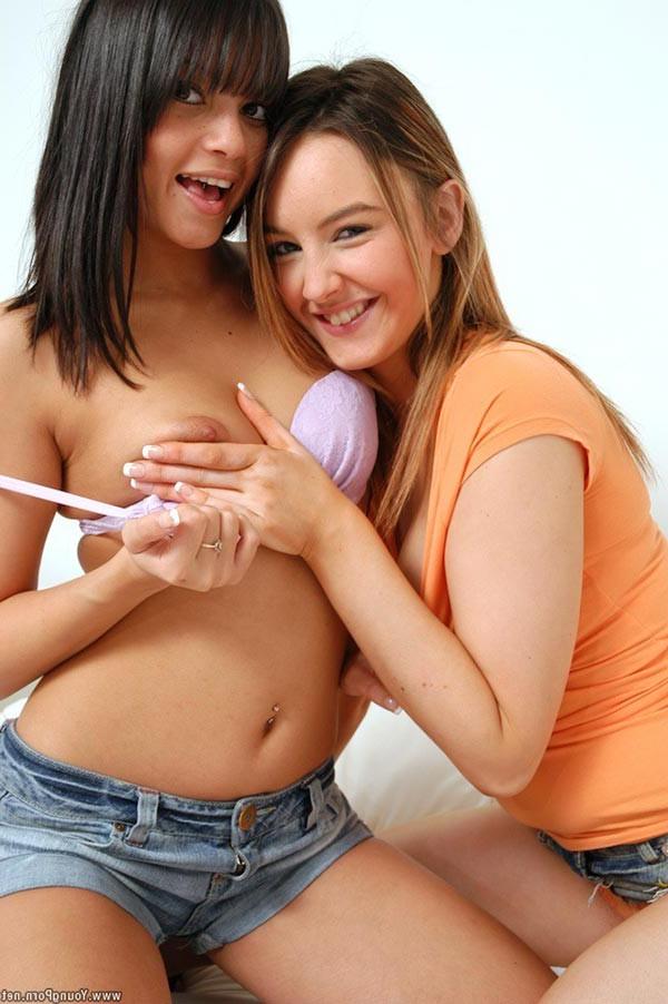 16P Two young exciting lesbian teenies playing with dildo on camera
