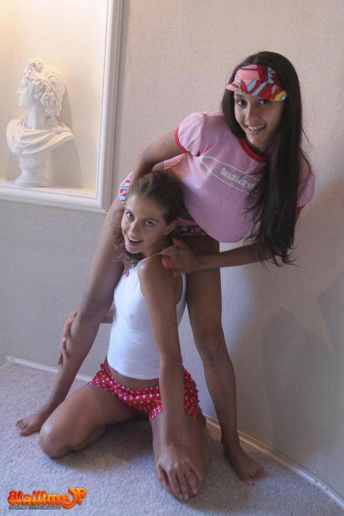 18P Two young fresh girlfriends stripping and teasing each other