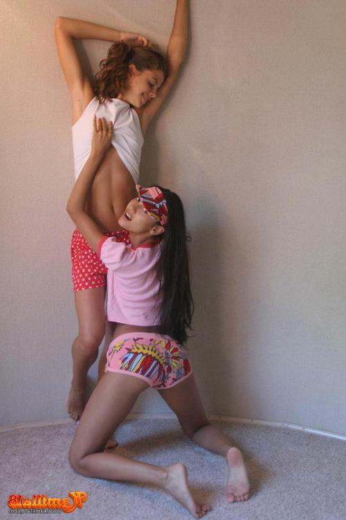 18P Two young fresh girlfriends stripping and teasing each other