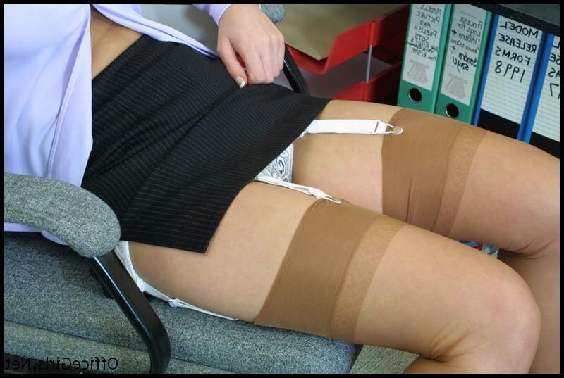 15P Office babe posing in tan stockings