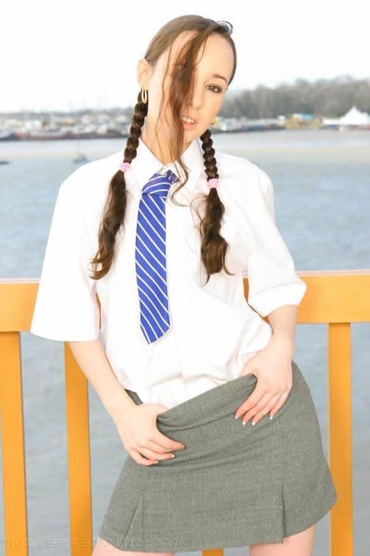 15P This brunette schoolgirl strips outdoors