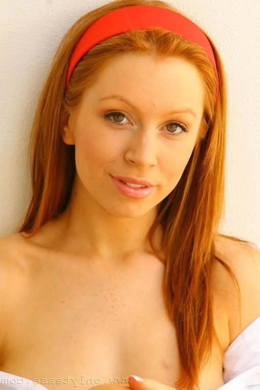 15P This naughty redheaded schoolgirl flashing her panties