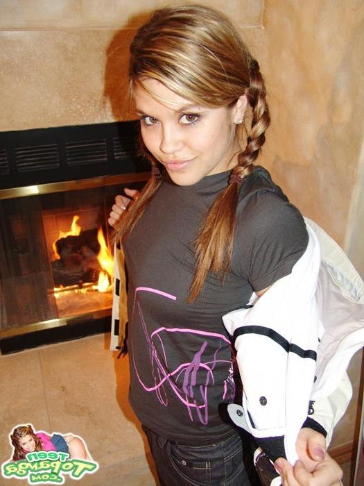 16P Firm young Teen Topanga warms her smooth body by the fire
