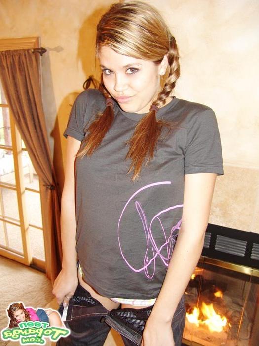 16P Firm young Teen Topanga warms her smooth body by the fire