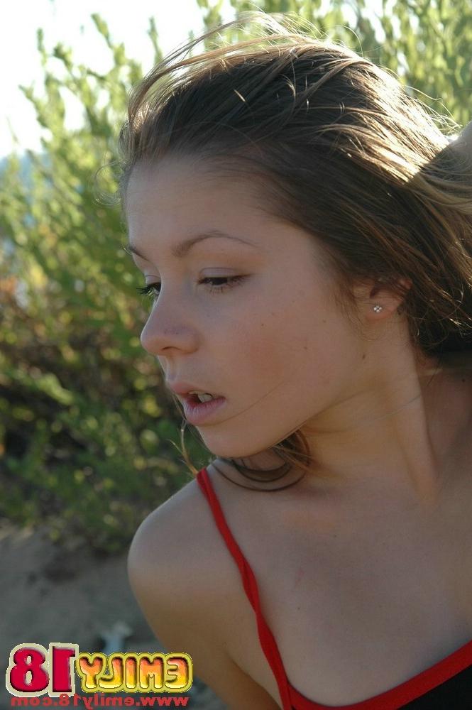 15P Young chick fooling around at the beach