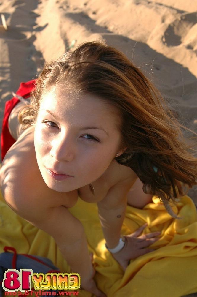 15P Young chick fooling around at the beach