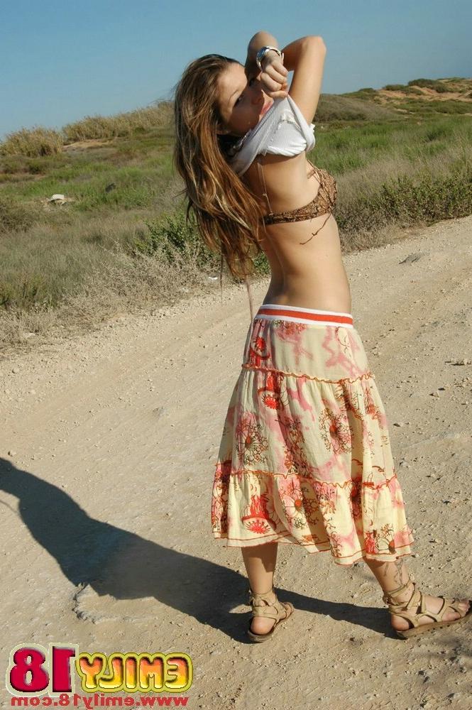 15P Young chick emily stripping at the beach
