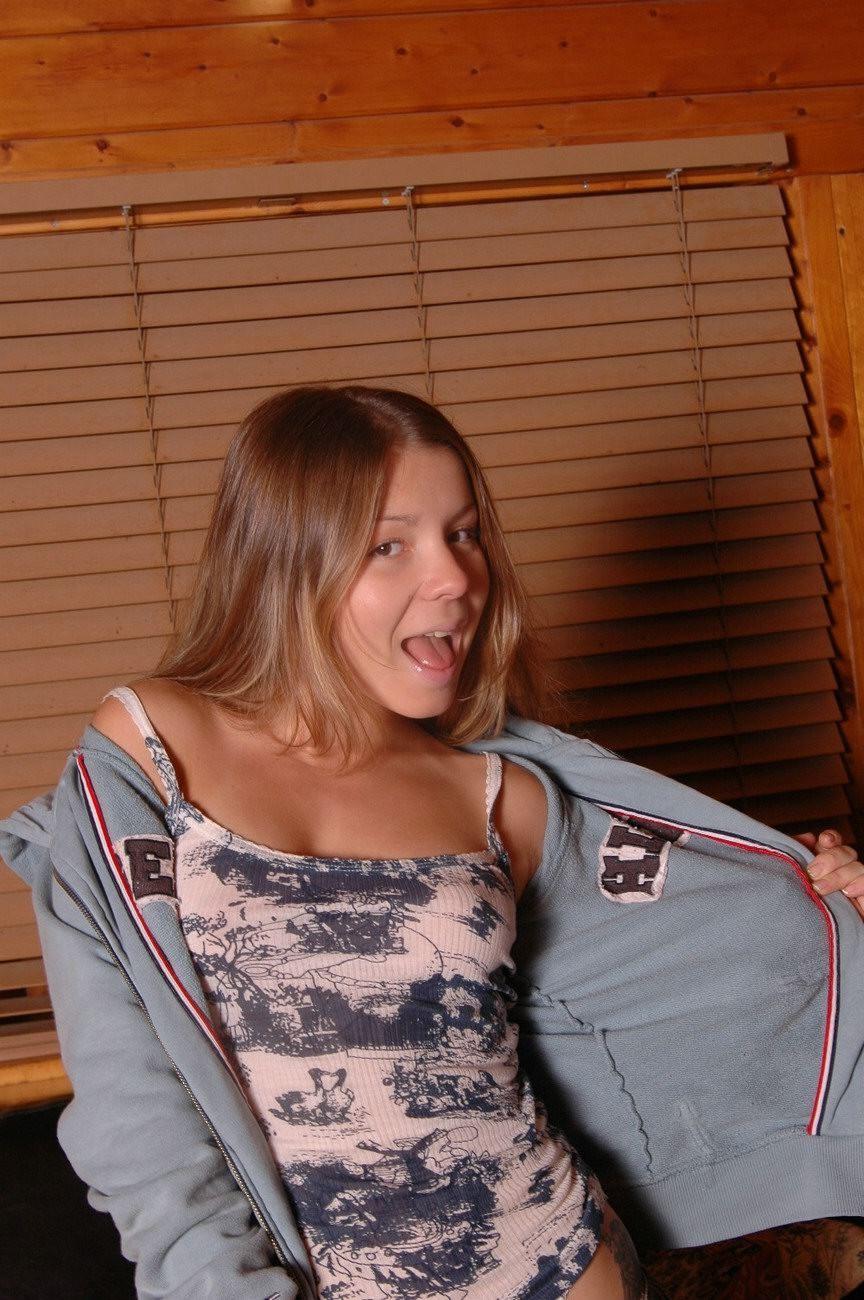 15P Young emily18 stripping down in a wooden house