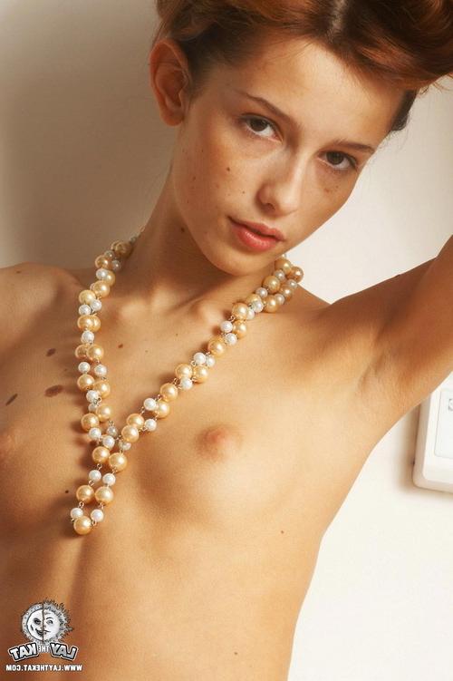 17P Young redhead teenie shows her naked skinny body