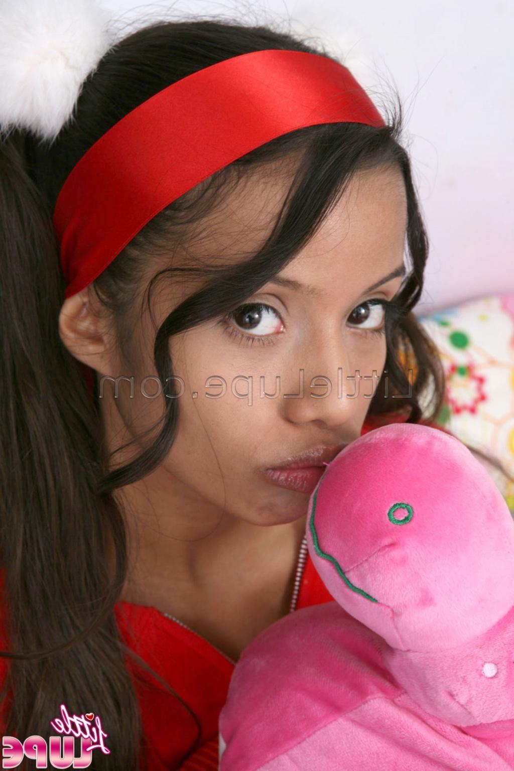 16P Seductive latina teenie shows her petite tits