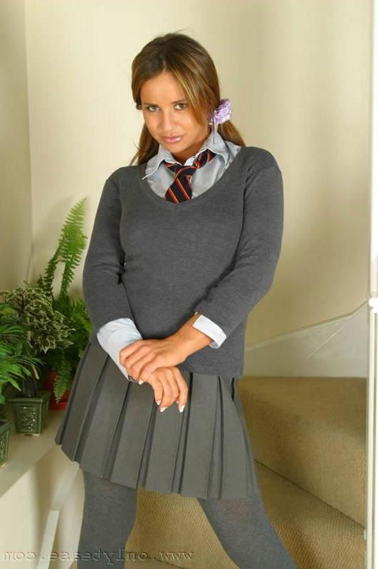 14P This sexy schoolgirl stripping out of her uniform