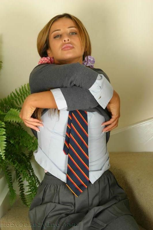 14P This sexy schoolgirl stripping out of her uniform