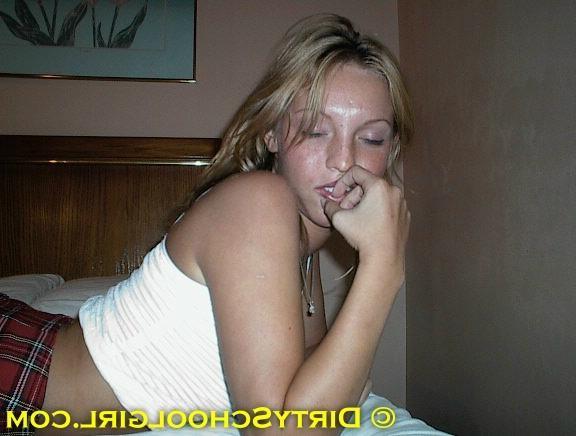 17P Teen schoolgirl in a skirt posing and teasing
