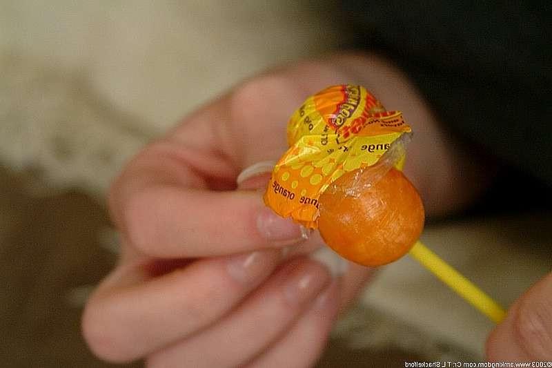 15P Schoolgirl rams lolipop rammed in her pussy