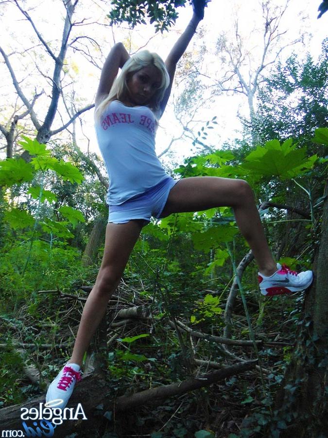 13P Sluttye and Very Hung Blonde Shemale Angeles Cid stroking her cock in the woods