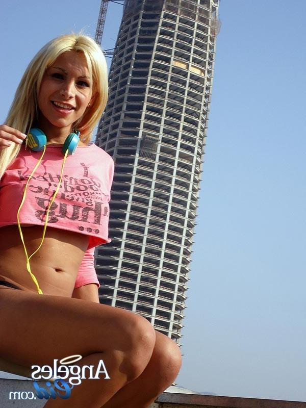 15P Shemale Angeles Cid showing her big chubby cock on the roof