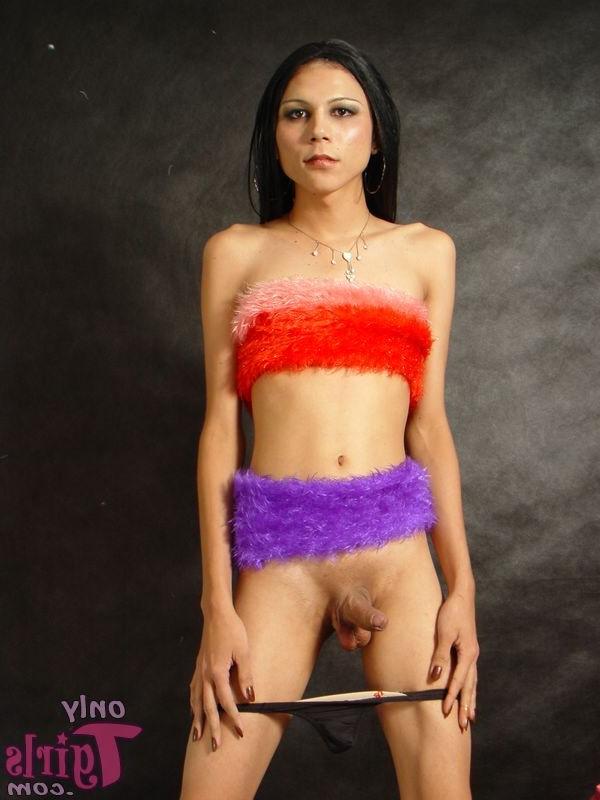 15P Slim shemale hottie in leather boots