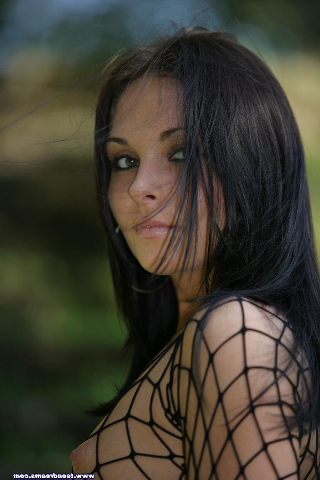 18P Stunning young brunnette gets naked in the outdoors