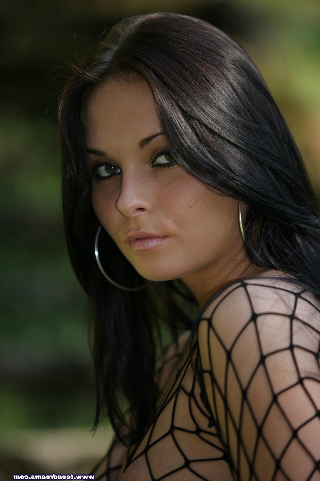 18P Stunning young brunnette gets naked in the outdoors