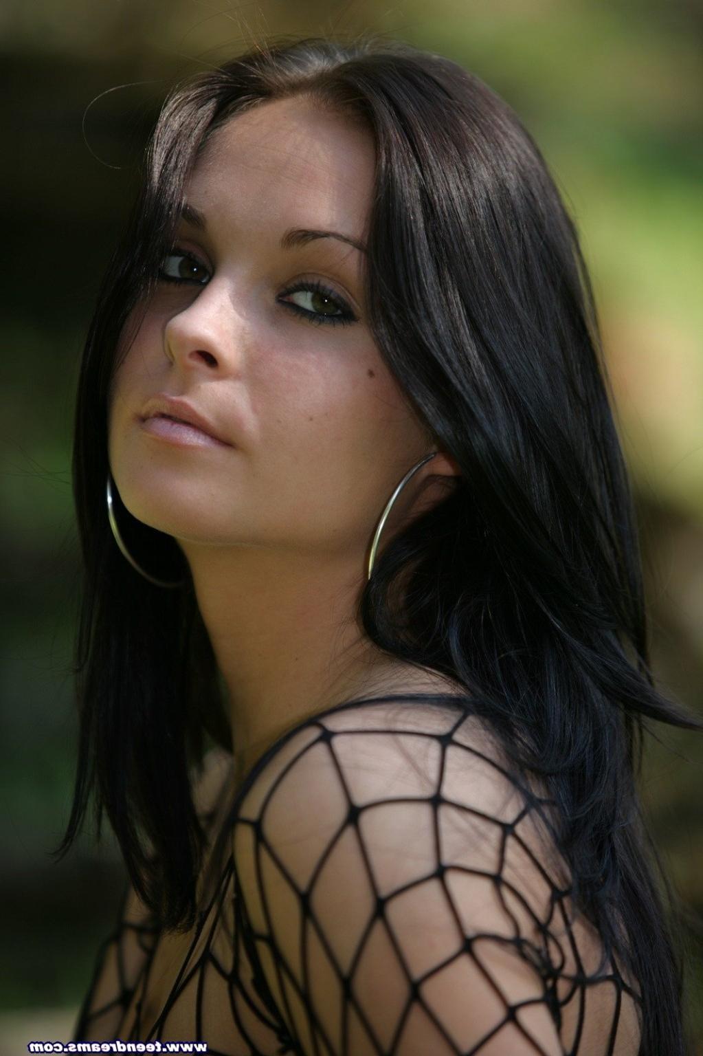 18P Stunning young brunnette gets naked in the outdoors