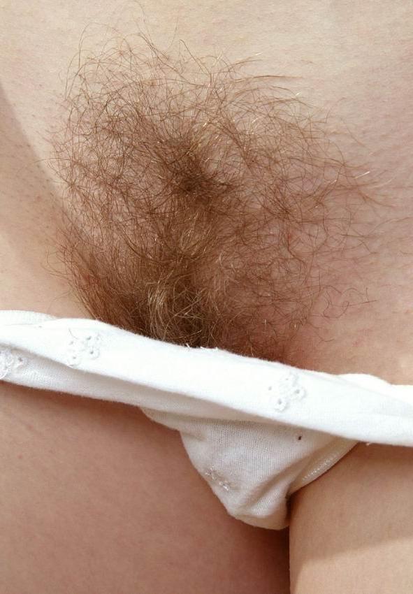 14P blonde spreading her hairy pussy and showing pink