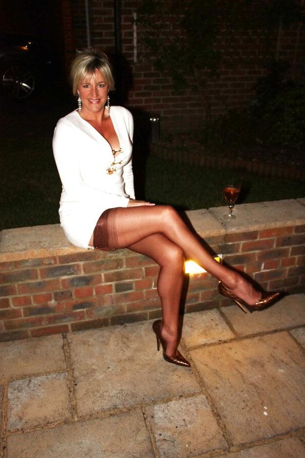 25P Mom likes to flash her stocking tops